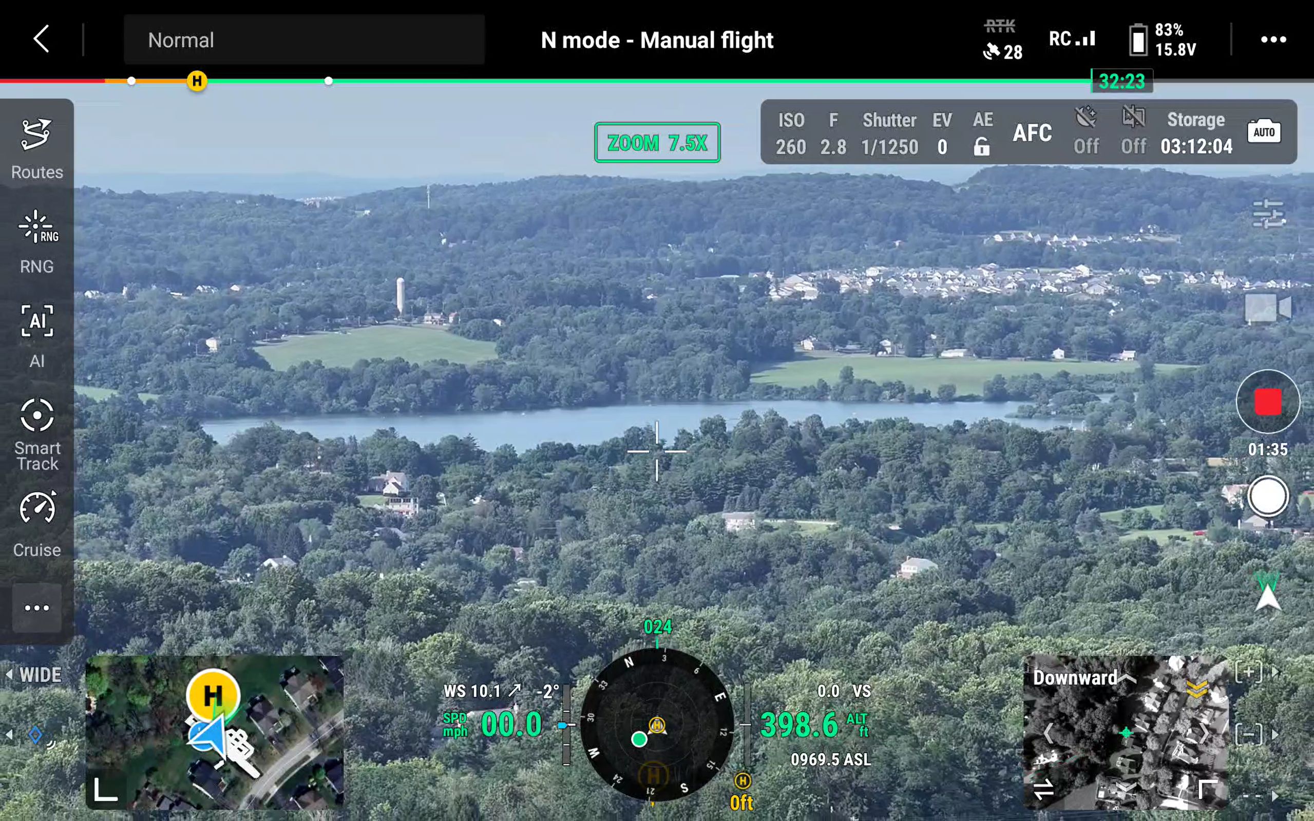 Drone flight control interface showing aerial view of scenic landscape with lake, forests and fields demonstrating mapping and surveying capabilities